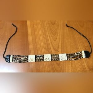 Choker- elephant tiles, beads, leather.